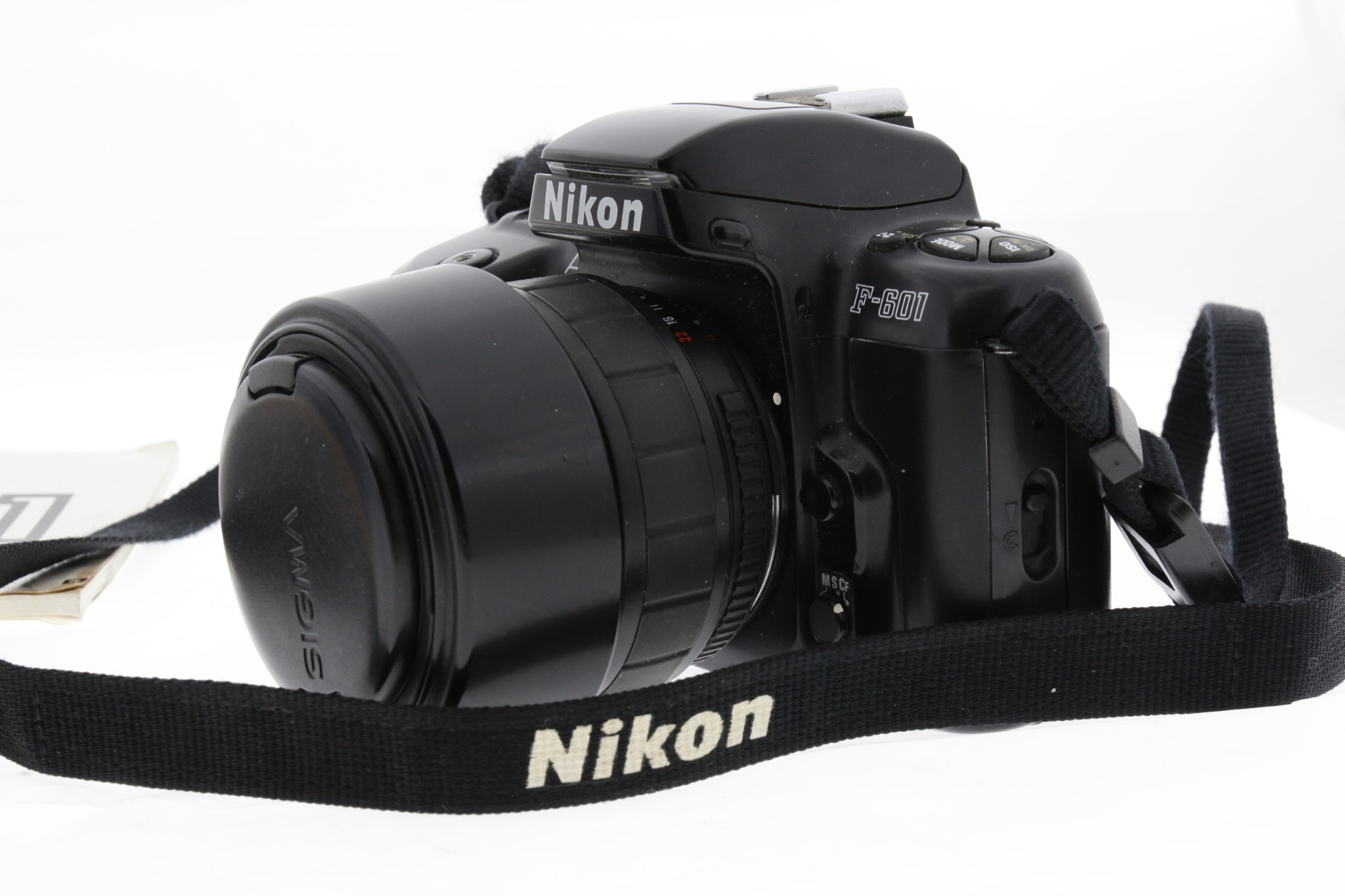 Zrcadlovka Nikon F601 + 28-70mm + film