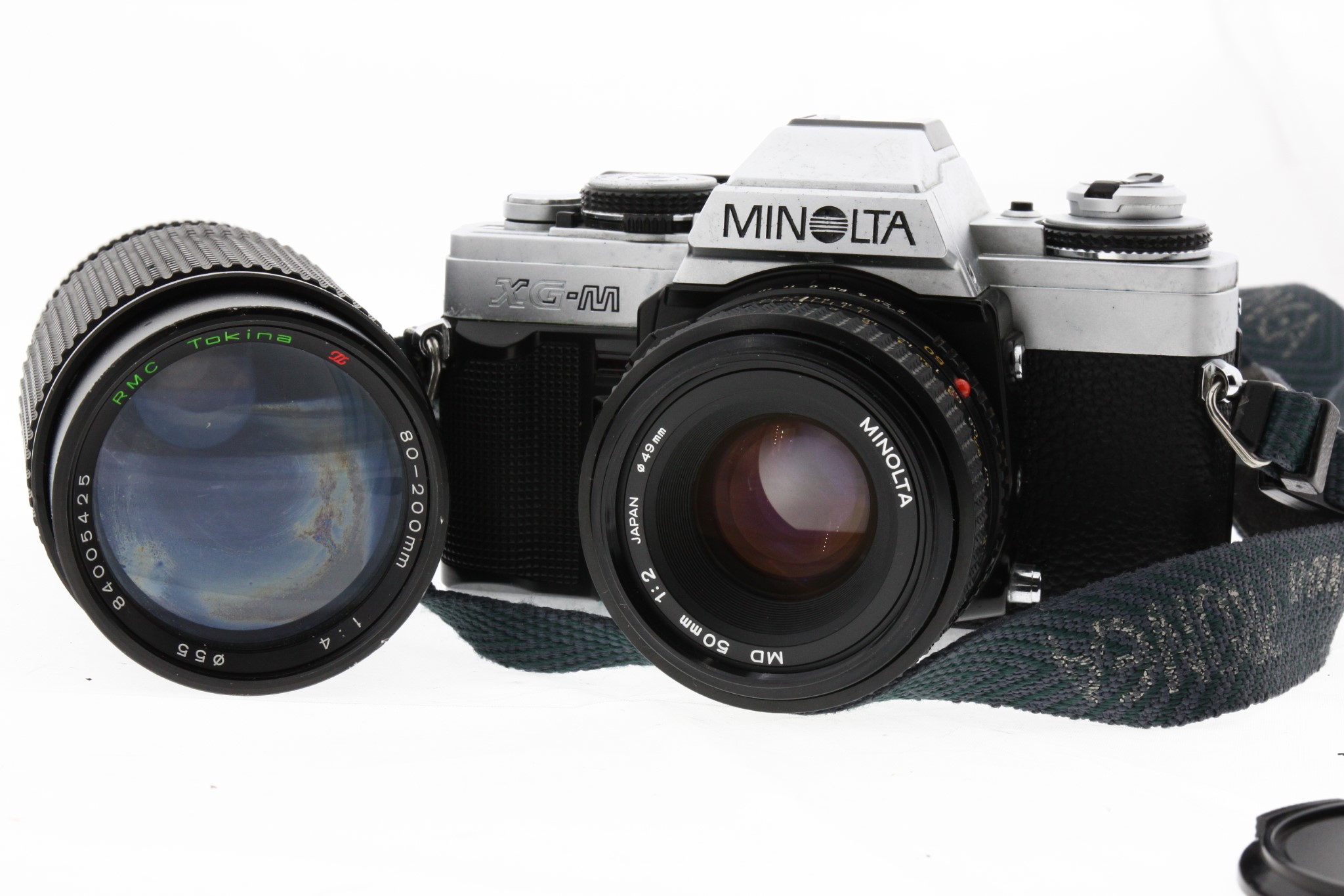 Zrcadlovka Minolta XG-M + dva objektivy + film 